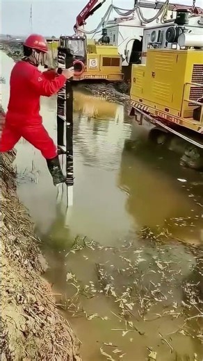 Worker Operating Pile Driver Gets Dragged into River