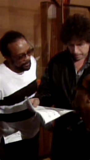 97K views · 2.4K reactions | Quincy Jones and Stevie Wonder work with Bob Dylan as he rehearses his solo on the 1985 recording of “We Are The World” on January 28, 1985 | "We Are the World: The Story Behind the Song" documentary courtesy of USA For Africa | USA For Africa | Facebook