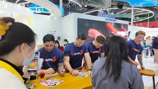 The Australian Firefighters Calendar team made a surprise appearance at the Queensland booth at the #CIIE2025 in Shanghai, handing out signed calendars and chatting with visitors as they helped shine a spotlight on the Sunshine State. | Yicai 第一财经