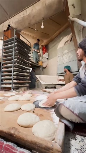 Afghan Bread in Kabul 🇦🇫🔥 Fresh from the tandoor, golden, soft, and full of tradition. Simple ingredients, powerful flavor. Food is the best peace language in the world. 🌍 #AfghanBread #Kabul #StreetFood #MrTaster #afghanistan | Hubert Sepidnam