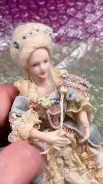 Miniature Rococo costumed dolls; who made them?