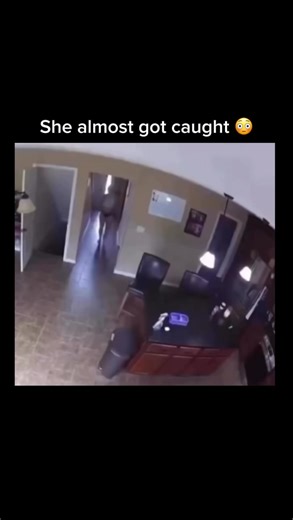 RAP ZONE🎵🔥 on Instagram: "Captured on a home security camera, this brief and tense moment shows a woman in a state of undress frantically attempting to hide as someone else enters the house. The scene unfolds in a living area where she quickly ducks behind a kitchen island or counter just seconds before another individual walks through the front door and down the hallway. The high-angle, grainy footage emphasizes the narrow window of time she had to avoid detection, creating a suspenseful “clo