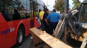 6 injured in NE crash between Metrobus and backhoe