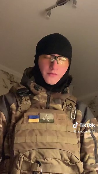 Military Tactical Outfit: Camouflage and Gear Overview