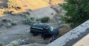 Car slides down overpass after crash along I-580 south near Mt. Rose
