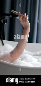 Girls taking photos in the bath in the foam, a friend taking photos on a mobile phone, filming videos for social networks, the joy of relaxation, enjoying the weekend, two friends. High quality FullHD Stock Video Footage - Alamy