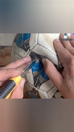 This man fixed a burst soccer ball like a true genius ⚽🔥