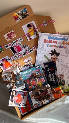 Gift Baskets & More on Instagram: "Make your kids smile with their fave cartoon gift box + custom coloring book! Hashtags: [(kids gift ideas, cartoon gift box, personalized gifts, Goku gift box, Roblox gift box, kids birthday gift, unique gifts for kids, creative gift ideas, cartoon coloring book, customized gifts)], #KidsGift #CartoonGiftBox #PersonalizedGifts #GokuGiftBox #RobloxGiftBox #BirthdaySurprise #CreativeGifting #CustomColoringBook"