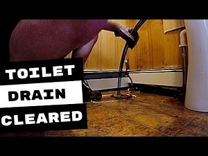 PLUMBING REPAIR CLOGGED SEWER LINE CLEARED FROM TOILET FLANGE