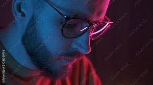 Artist composing new song on digital electronic piano keyboard at home recording studio. Man playing music on computer. Sound maker create music melody. Fingers tapping drum pads on midi controller