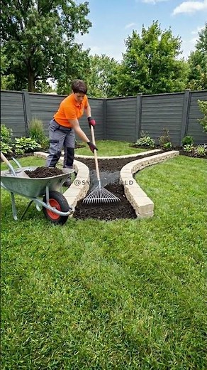 Transforming our empty backyard corner with a beautiful DIY stacked stone raised flower bed! 🌸🧱