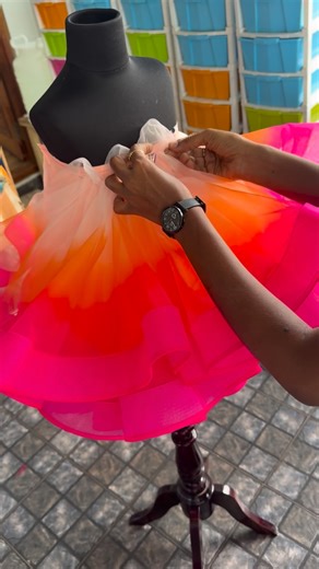 Sowmiya Duraisamy on Instagram: "✨ Sunset Bloom Couture Dress ✨ A burst of pink, orange, and peach—crafted to make your little one shine like a summer sunset. Finished with oversized floral detailing and layered ruffle volume for the most dreamy twirl. Perfect for birthdays, shoots & special celebrations. Made with love by Sowmyz Couture 🌸💖 baby birthday dress • first birthday outfit • partywear frock • designer kids dress • colourful tutu dress • couture frock India • custom-made baby dress •