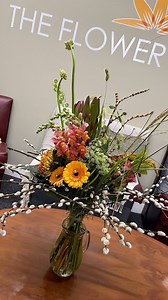 Check out our stunning bouquet from the first workshop of our 3-week Fun with Flowers course! We crafted a modern design with grouped flowers arranged in a frame of pussy willow stems, and added an autumnal palette with hydrangea, amaranthus, grasses, aspidistra leaves, bronze chrysanthemum blooms, and leucadendron. 🍁 #AutumnBlooms #FloralDesign #FlowerWorkshop #AutumnFlowers #flowerschool #simplyflowers | Simply Flowers