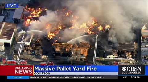 Massive pallet yard fire burning in Los Angeles