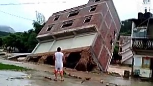 A three-story building collapsed in less than 10 seconds | NowThis