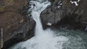Scenic View Of Aldeyjarfoss Waterfall Surrounded By Unique Basalt Columns In Iceland. Aerial Shot