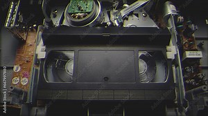 VHS Tape Inserted and Playing in a VCR Filter