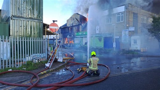 London warehouse engulfed in flames may contain fireworks, firefighters warn
