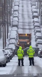 Snowplow Slides Down Hill And Crashes Into Active Accident Scene Pittsburgh, Pennsylvania — A snowplow traveling downhill on a steep residential street lost control as icy conditions covered the roadway. The truck continued sliding despite the blade being lowered, picking up speed as it descended. At the bottom of the hill, multiple vehicles were already stopped as crews worked to clear a previous wreck. The plow drifted sideways and collided with the scene, striking vehicles that had been posit