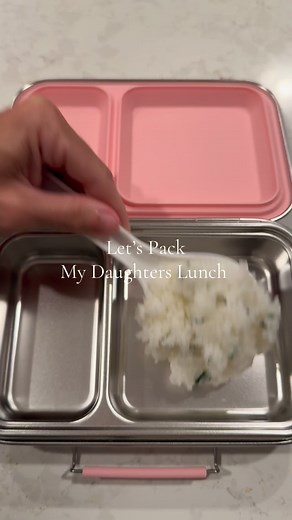 Today’s lunch was cilantro, lime rice topped with shredded lettuce, salsa, avocado, fire, roasted corn, baked chicken breast, and cotija cheese with half a mango for dessert. | Tyler Yan