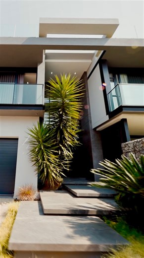 This exquisite Hyde Park residence is the developer’s personal showcase, offering a meticulous blend of modern design and resort-style living. Peace of mind is paramount: a 24/7 guarded, boomed enclosure, plus strict complex access control. A dramatic, double-volume entrance with a statement chandelier and floating staircase sets the tone for elegant interiors. The open-plan lounge and dining room flow to a vast covered patio and braai area, perfect for entertaining, overlooking a garden with sp