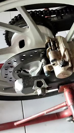 Proper Motorcycle Wheel and Brake Adjustment Techniques