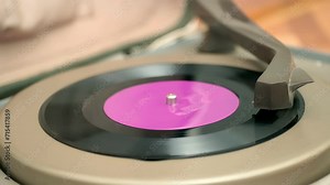 Retro Gramophone Makes Sound With Old Vinyl; Old gramophone is playing a single record