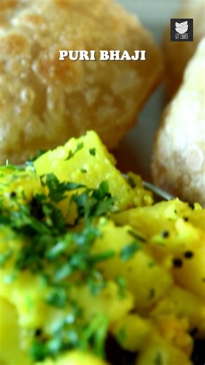 Puri Bhaji — soft, fluffy puris paired with spiced, flavorful aloo bhaji, creating the perfect classic breakfast or snack that never fails to satisfy. Host: Smita Deo Ingredients:- For Poori/Puri:- 3 cups Wheat Flour 2 tbsp. Semolina Salt to taste Oil for frying For Bhaji:- 1 kg. potatoes boiled, peeled and cubed into 1” pieces 2 tbsp. Oil A pinch of asafoetida 1 tsp Mustard Seeds 5-6 green chillies, slit ¾ tsp. Turmeric powder Few Curry leaves Juice of 1 lemon Salt to taste ½ cup freshly choppe