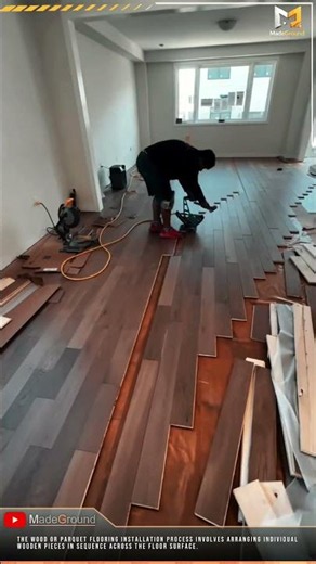 Precise Wood Flooring Installation Using Manual Skill and Pneumatic Tools