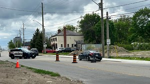 Crash between motorcycle and Honda Civic in Kitchener