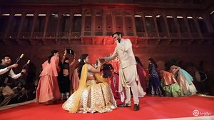 334K views · 8.3K reactions | We're in love with bride Nupur's flash mob performance where she surprises her groom Akshay by pulling him onstage and then going down on her knees!  But his own reaction wins all hearts  #zowed #flashmob #surpriseproposal Video by Twogether Studios Outfit by Abhinav Mishra Venue Narendra Bhawan Bikaner | ZoWed | Facebook