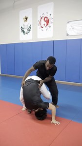 Dive roll knee bar from a bear hug position! #martialarts #mma #selfdefense #judo #jiujitsu | Kevin Lee