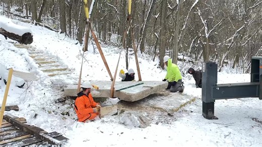 We’re so excited! Here is one more video showing the 7,000 pound limestone slab being placed as a natural bridge near the Lime Kiln Trail waterfall area. #highcliffstatepark #niagraescarpment #naturalbridge | Friends of High Cliff State Park