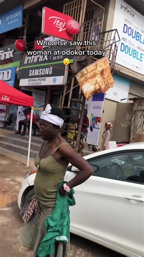 Exploring Busy Streets: A Woman's Walk in Odoker