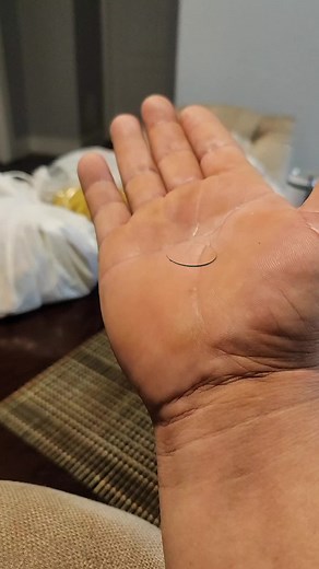 Superhero Animation on Human Hand Close-Up