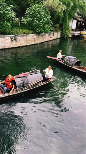 A Traditional Black Boat in China’s Ancient Water Town