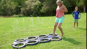 HearthSong Inflatable Tire Run with Sprinkler for Kids Outdoor Active Play, 58" L, for Use with or Without Water