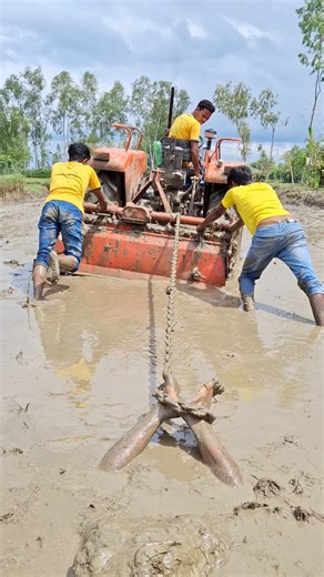 Human feet are seen while cultivating the land.