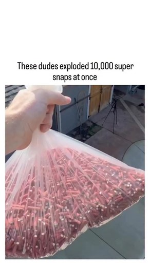 Lazy Legend on Instagram: "The post shares a viral clip from fireworks experimenter PolarBearPyro's December 2025 YouTube video, showing men dumping and stomping 10,000 super snaps—small popper fireworks—on concrete, triggering a rapid chain of explosions, sparks, and dense smoke lasting seconds. Uploaded to the @DudespostingWs account for ironic wholesome humor, it exploded in popularity overnight with 649,000 views and 12,800 likes, drawing replies joking about panicked neighbors mistaking it