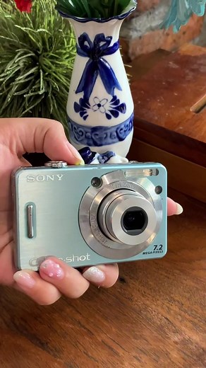 Blue Sony DSC-W55 Camera in Action