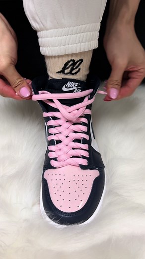 Laces can make a BIG difference These Jordan 1 High ‘Atmosphere’ is nicknamed ‘Bubblegum’ as a cheeky nod to the pink gum Michael Jordan used to chew on the basketball courts! The sneaker even has a little pink gum-shaped splotch on the sole of the sneaker as if it has stepped on some. We love the Light pink patent leather against the dark navy and white colorway and wanted to play up this color while adding a little more volume and structure. We used a cross-hatch lacing technique to give this 