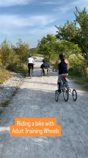 Andy Nelson on Instagram: "Adult Training Wheels ⁉️ Yes! And they are a game changer! I used stationary bikes in physio to help me gain function back and strengthen the muscles in my legs after my spinal cord injury. It made me really want to get on a real bike, but the issue was that I needed my feet strapped to the pedals or they wouldn't stay on. That meant I needed to have a bike that would stay upright on its own, since I wouldn't be able to put my feet down when stopped. The options were a