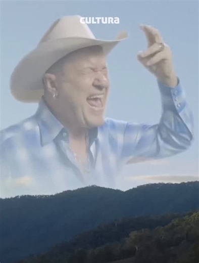 Cultura Magazine on Instagram: "AAHHHH..!! Kultus internet yang lahir dari kombinasi musik serius dan absurditas maksimal. Walaupun musiknya sebenarnya bergenre indie pop–country experimental, laug “Big Enough” meledak karena satu hal: teriakan Jimmy Barnes yang muncul sebagai koboi hantu raksasa di langit dalam video klip. Barnes, legenda rock Australia, diminta Kirin J Callinan untuk mengisi “vocal scream” epik. Teriakannya direkam secara serius di studio, tapi justru menjadi bahan meme di sel