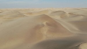 Drone flying over the desert. Desert aerial panorama.
