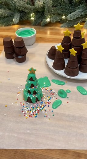 Peanut Butter Cup Christmas Trees Ingredients: 1 cup creamy peanut butter ¼ cup unsalted butter, softened 1 cup powdered sugar 1 cup graham cracker crumbs (about 8 full sheets, crushed) 1 package milk chocolate chips (about 12 oz) 1 package green candy melts (or white chocolate dyed green) Optional: sprinkles, mini M&M’s, or edible pearls for decorations Instructions: 1. Make the Peanut Butter Base In a large bowl, mix together the peanut butter and softened butter until smooth and creamy. Add p