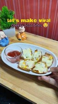 Cheesy pizza bites 🤤#trending#food#recipe#cooking#viral#pizzabites#pizza#shorts#cheese#cheesepull