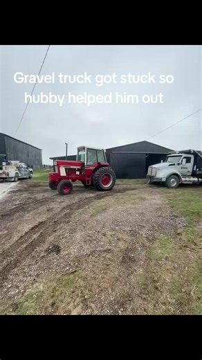 Tractor Helps Stuck Gravel Truck in Kentucky