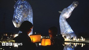 Pipers and silence mark Scotland's moment of reflection