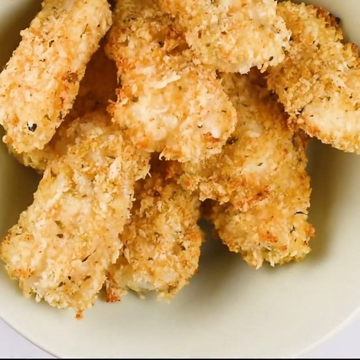 The most delicous crispy Baked Parmesan Fish Sticks. Kids and adults LOVE them!! Just 200 calories and 3 Freestyle Smartpoints Get the recipe: https://www.slenderkitchen.com/recipe/parmesan-fish-sticks | Slender Kitchen