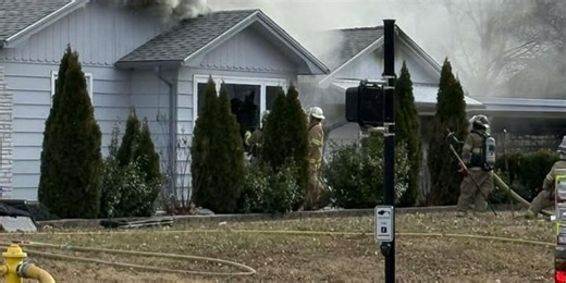 Crews battle house fire in Springfield